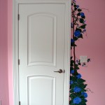The edge of this nursery door is framed by a Morning Glory vine